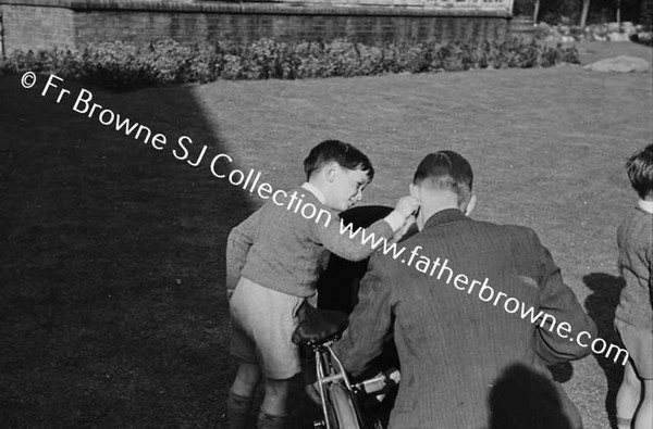 JOHN MALLICK PLAYING WITH HIS COUSINS O'NEILL & MRS O'NEILL AT MALLICKS ON CURRAGH